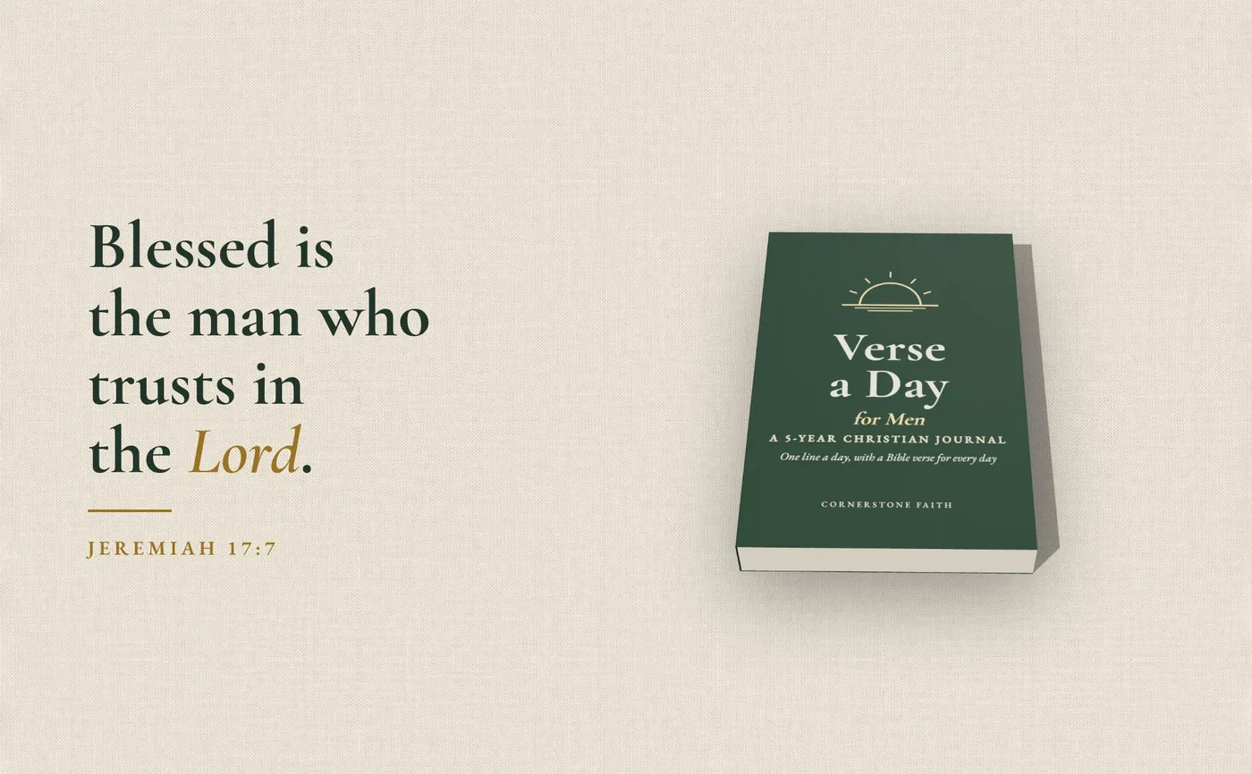 Verse a Day for Men lying flat beside the verse Blessed is the man who trusts in the Lord